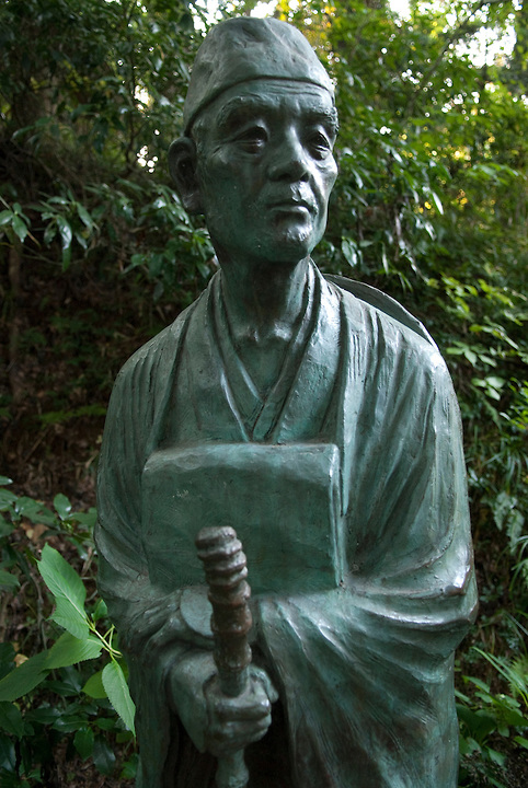 A statue of Matsuo Basho at Chusonji temple, Hiraizumi, Japan, 28 August 2008. The poet visited Hiraizumi during the writing of the Narrow Road to the Deep North. Hiraizumi in Northern Japan flourished as the seat of the Oshu Fujiwara clan for around 100 years from the end of the 12th century. The city was built to be an earthly recreation of the Buddhist "Pure Land" or Nirvana.
